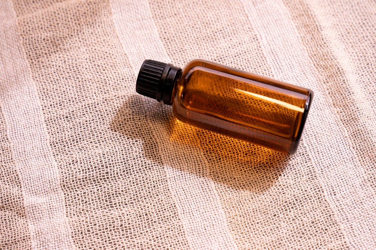 Thrifted amber glass bottle in warm light