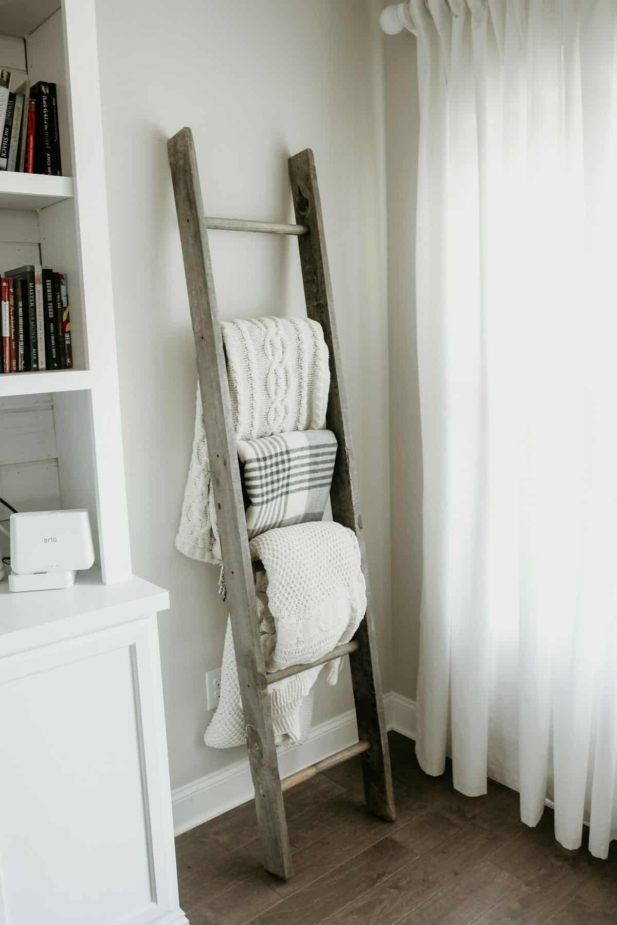 Ladder styled with cozy neutral throws