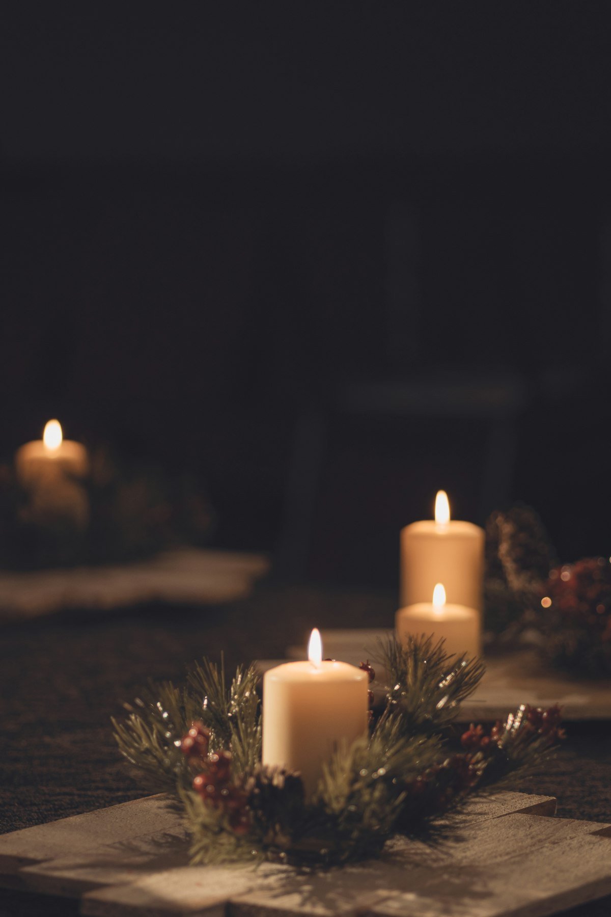 Candles glowing as a simple Christmas table centerpiece