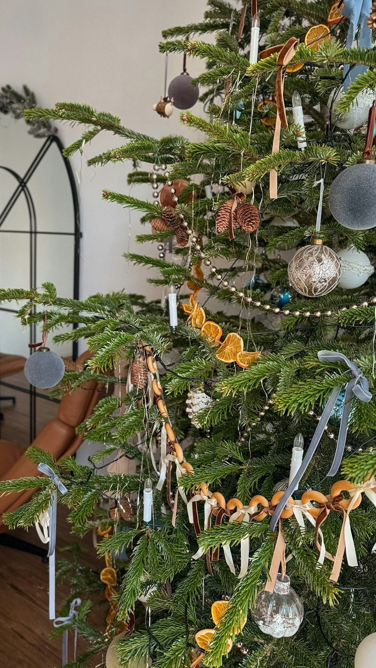 Dried orange slice garland hung on a Christmas tree