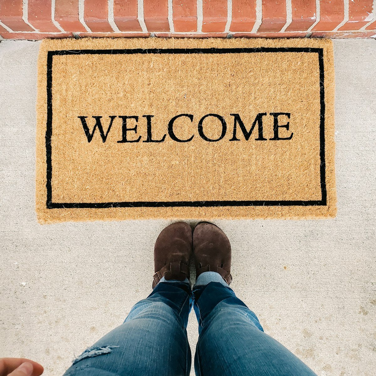 Coir welcome doormat at the front door