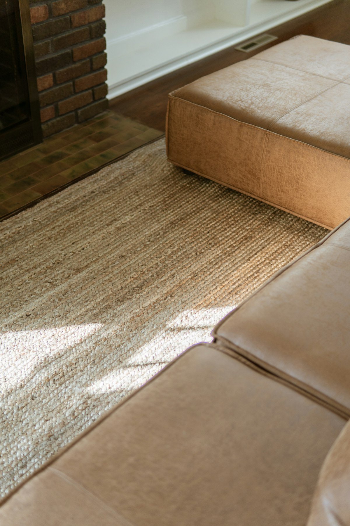 Natural jute rug adding texture to a living room floor