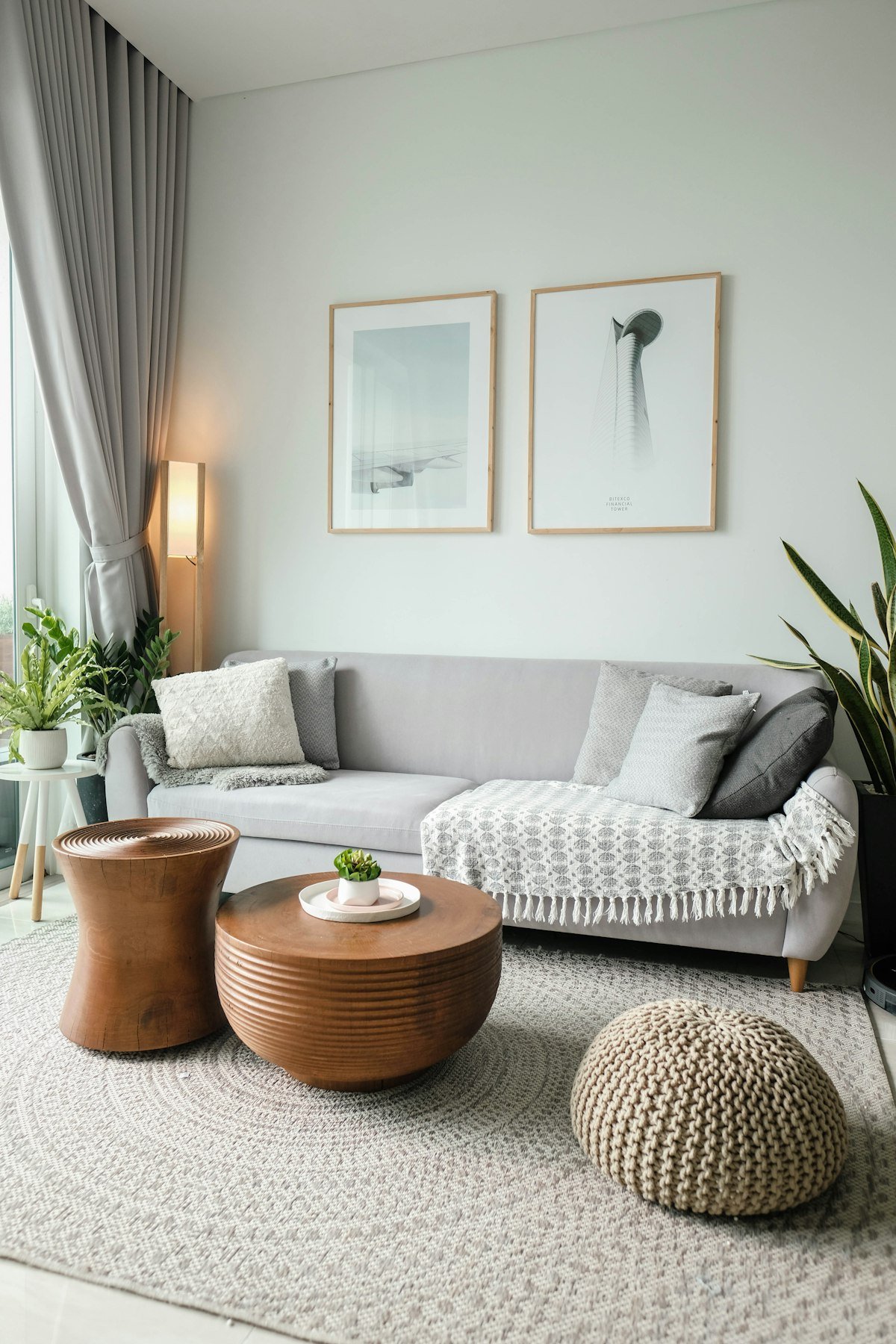 Living room seating area anchored by a large area rug