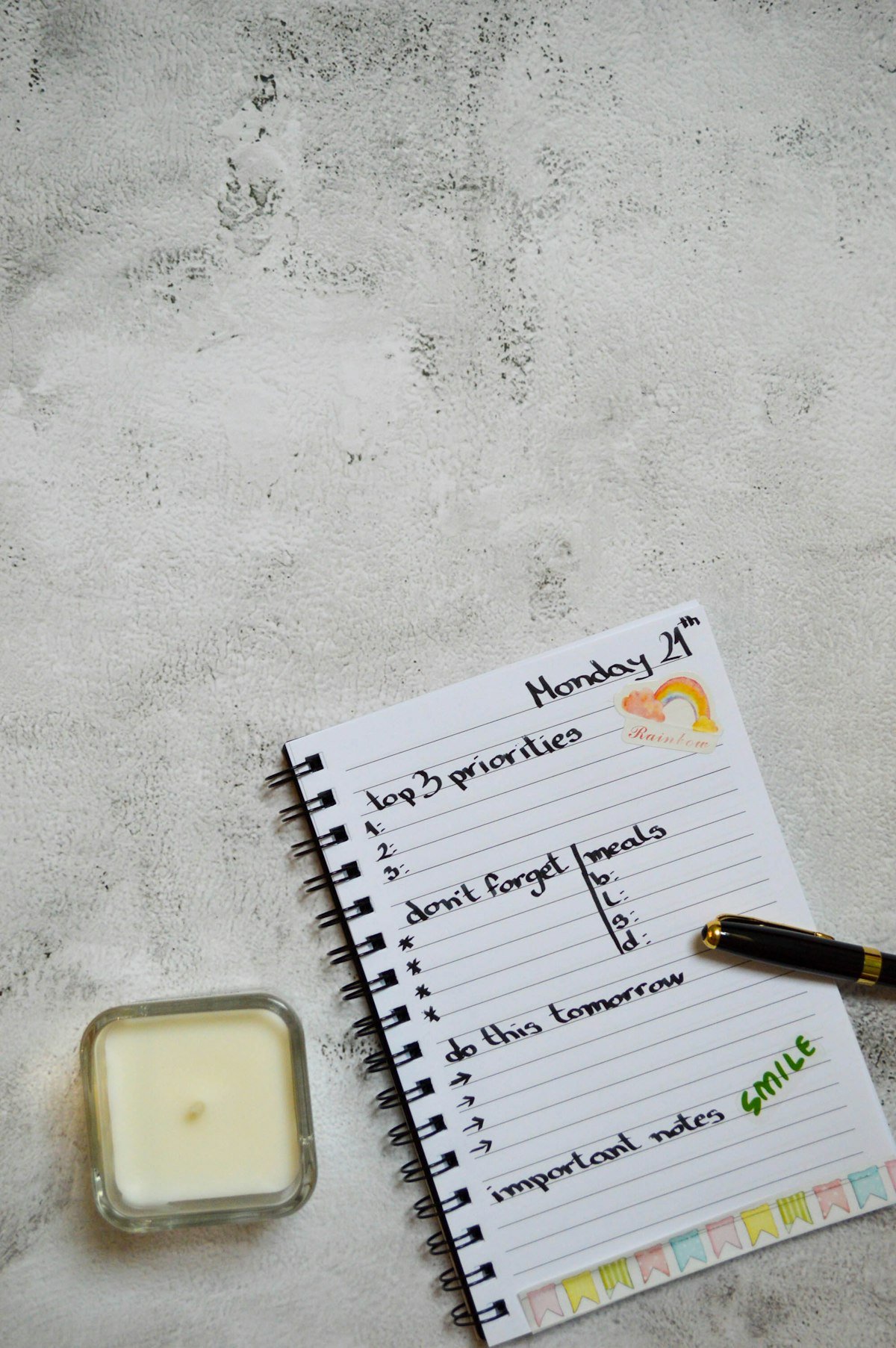 Handwritten party planning list in a notebook