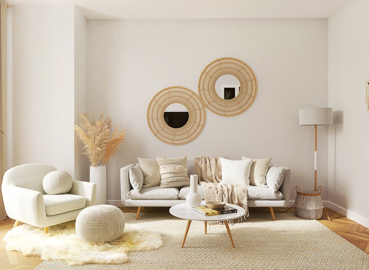 Living room painted in warm white with light neutral furniture